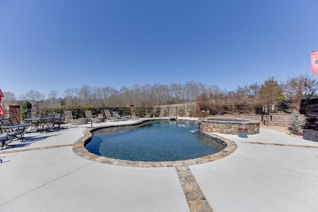 486 Gold Bullion Dr E, Dawsonville, GA 30534 - view of swimming pool with a patio, a fenced backyard, and a pool with connected hot tub