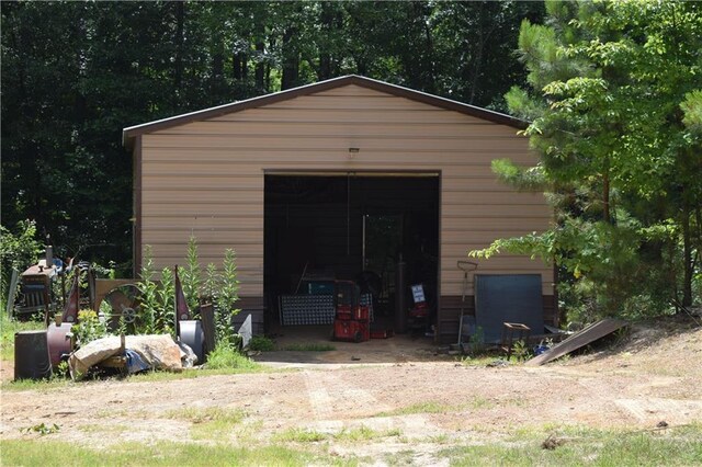 view of outbuilding with a garage