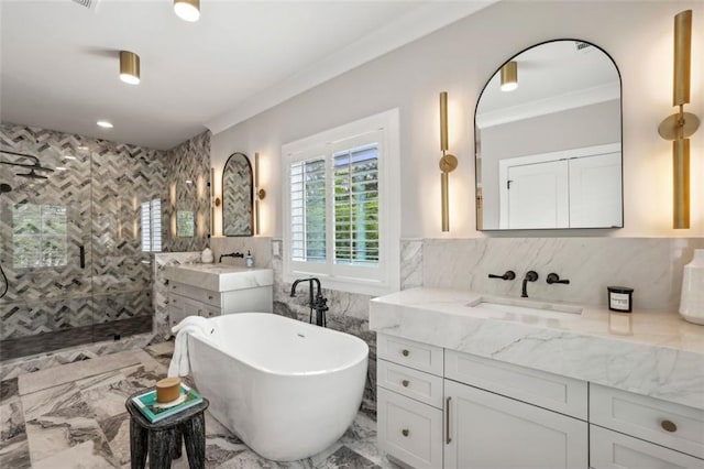 2583 Apple Valley Rd, Brookhaven, GA 30319 - full bathroom with tile walls, walk in shower, a soaking tub, crown molding, and vanity