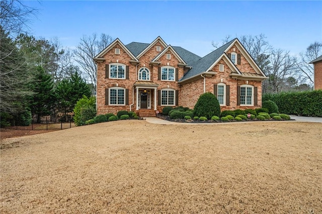 view of front of home with brick siding