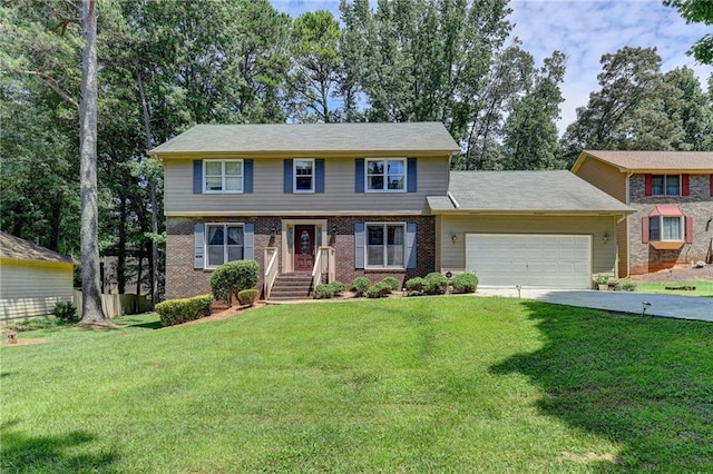 view of front of property featuring a front yard and a garage