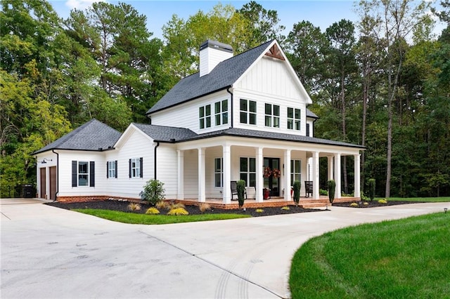 modern farmhouse style home with a porch