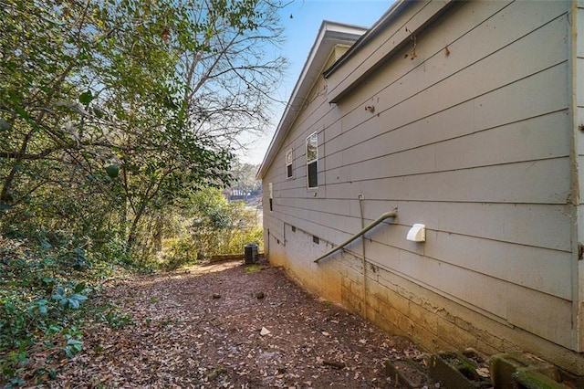 view of property exterior featuring central air condition unit