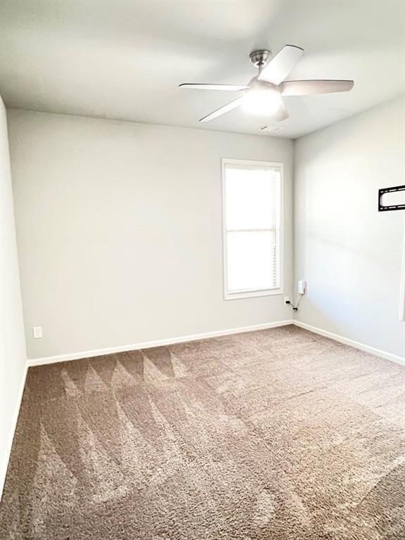 2300 Ivy Birch Ln, Buford, GA 30519 - carpeted spare room with ceiling fan and baseboards