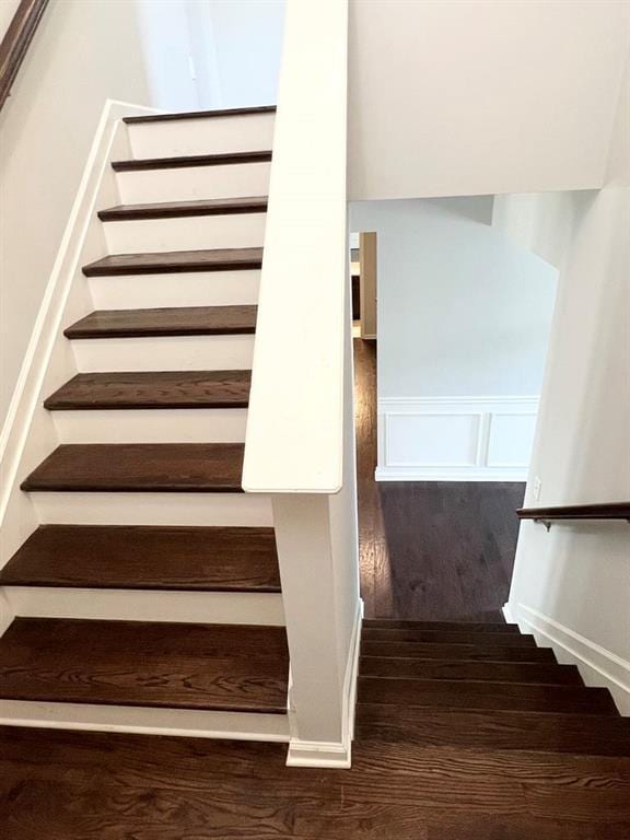 2300 Ivy Birch Ln, Buford, GA 30519 - staircase with wood finished floors and a wainscoted wall