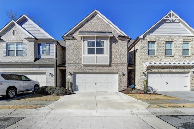 multi unit property featuring a garage