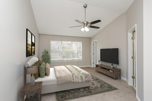 bedroom with vaulted ceiling, carpet floors, baseboards, and a ceiling fan