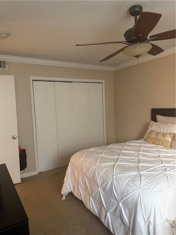 3120 Seven Pines Ct Unit 203, Atlanta, GA 30339 - carpeted bedroom with ornamental molding, ceiling fan, and a closet