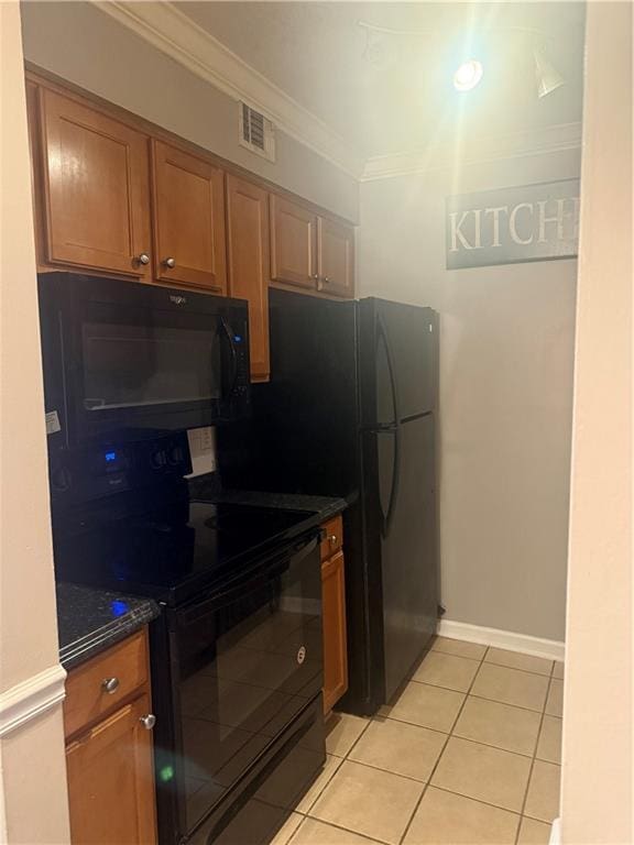 3120 Seven Pines Ct Unit 203, Atlanta, GA 30339 - kitchen featuring black appliances, ornamental molding, brown cabinets, and light tile patterned floors