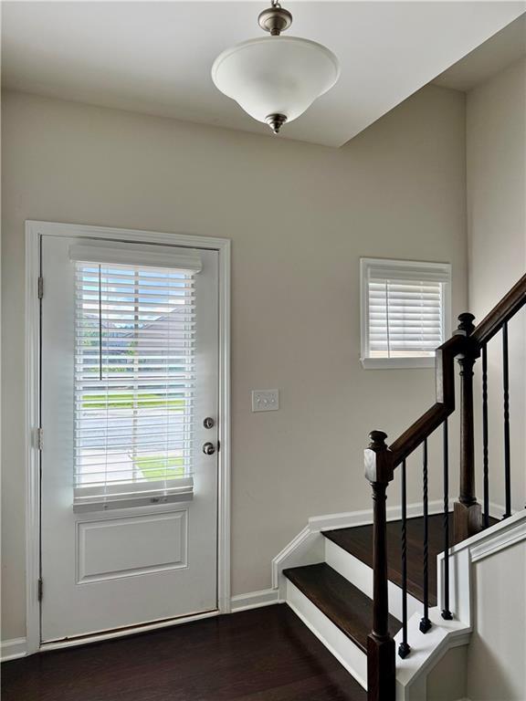 1452 Ridgebend Way SE, Mableton, GA 30126 - entryway featuring dark wood-style flooring and stairs