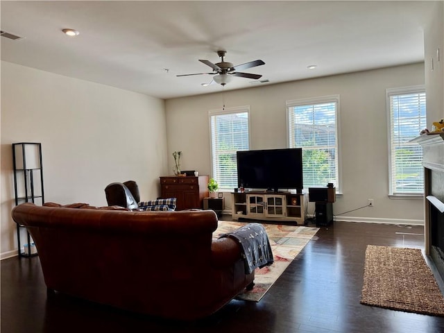 1452 Ridgebend Way SE, Mableton, GA 30126 - living room featuring plenty of natural light, a ceiling fan, a fireplace, dark wood-style floors, and recessed lighting