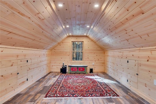 bonus room with wood-type flooring, wood ceiling, lofted ceiling, and wood walls