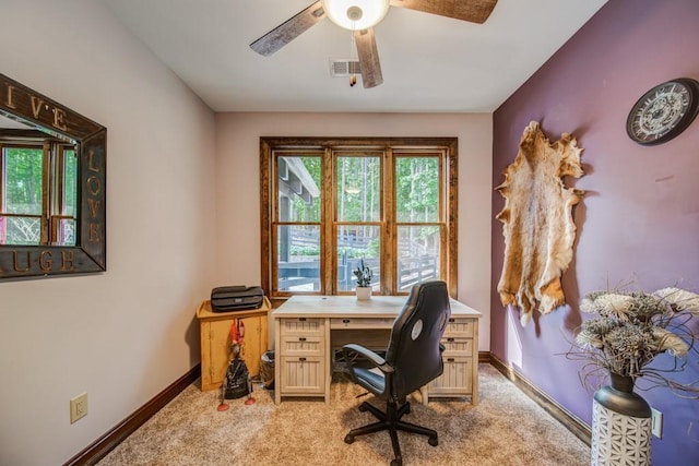 office space with carpet flooring and ceiling fan