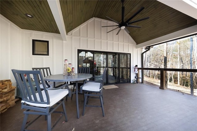 sunroom / solarium featuring ceiling fan, wooden ceiling, and lofted ceiling