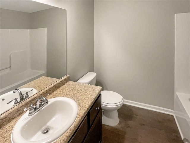 bathroom with vanity, toilet, and walk in shower