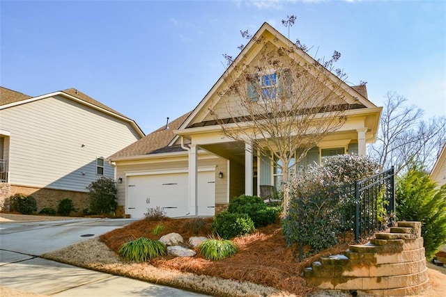 view of front of property featuring a garage