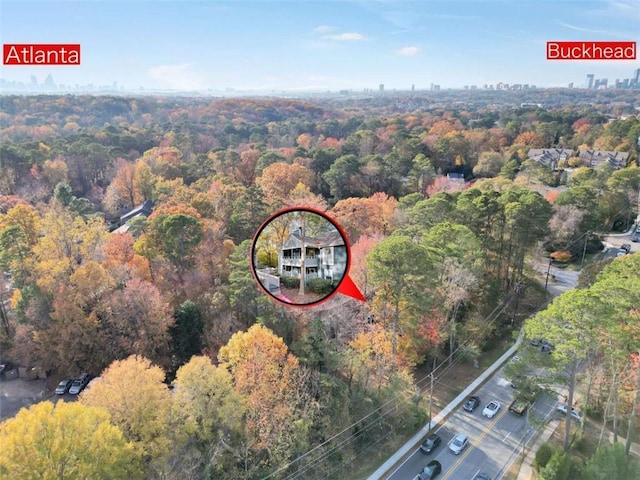 aerial overview of property's location featuring a forest