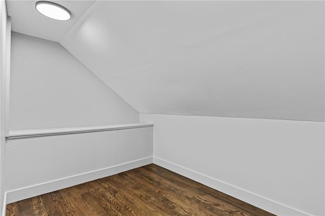 1887 Shalimar Dr, Atlanta, GA 30345 - bonus room featuring vaulted ceiling, baseboards, and dark wood-style flooring