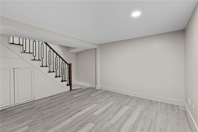 1887 Shalimar Dr, Atlanta, GA 30345 - finished below grade area with light wood-style flooring, stairway, baseboards, and recessed lighting