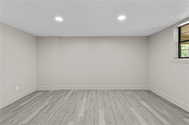 1887 Shalimar Dr, Atlanta, GA 30345 - unfurnished room featuring light wood-style flooring, baseboards, and recessed lighting