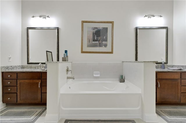 bathroom featuring a bathtub and vanity