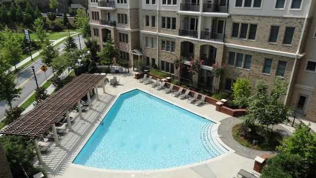 community pool with a patio