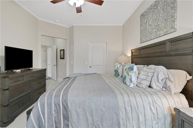 bedroom with ceiling fan and crown molding