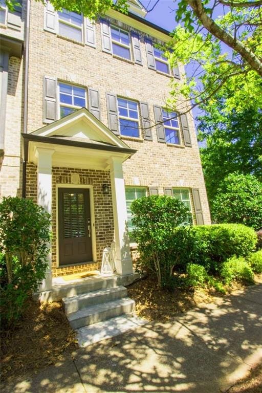 1420 Baygreen Rd, Suwanee, GA 30024 - property entrance featuring brick siding