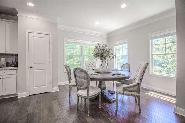 1420 Baygreen Rd, Suwanee, GA 30024 - dining space featuring dark wood-style flooring, baseboards, crown molding, and recessed lighting