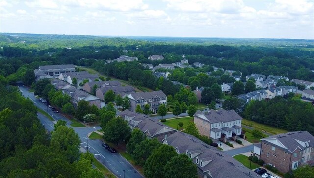 1420 Baygreen Rd, Suwanee, GA 30024 - aerial perspective of suburban area featuring a heavily wooded area