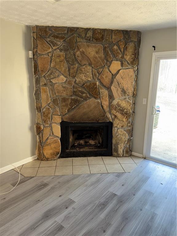 6745 Trafalger Sq, Norcross, GA 30093 - bathroom with toilet, vanity, a textured ceiling, and tile patterned floors