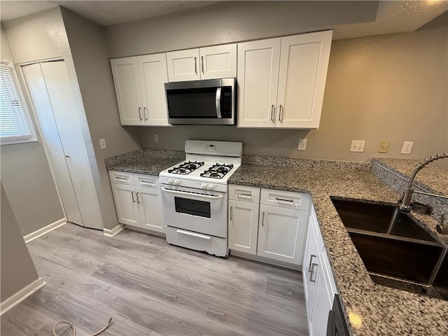 6745 Trafalger Sq, Norcross, GA 30093 - living room featuring hardwood / wood-style floors and a textured ceiling