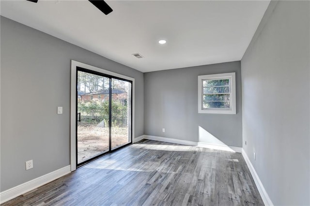 empty room with wood-type flooring