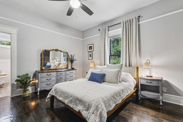 bedroom with wood finished floors, baseboards, and ceiling fan