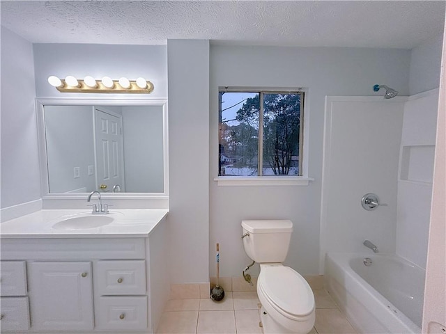 full bathroom with bathing tub / shower combination, vanity, a textured ceiling, tile patterned floors, and toilet