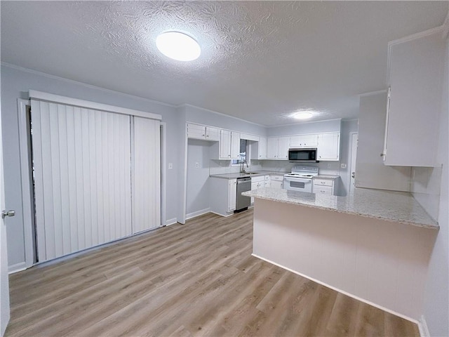 kitchen featuring white electric range, white cabinetry, a textured ceiling, dishwasher, and kitchen peninsula