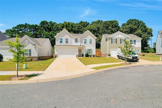 view of front facade with a garage and a front lawn