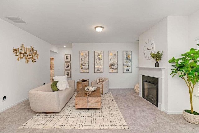 939 Brittfield Way, Loganville, GA 30052 - living area featuring carpet and a glass covered fireplace