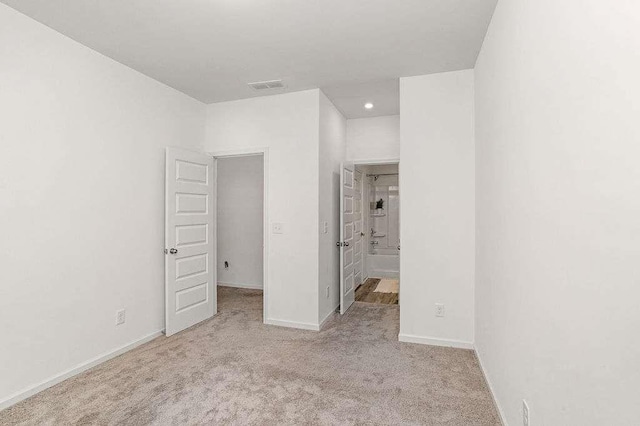 939 Brittfield Way, Loganville, GA 30052 - unfurnished bedroom with carpet floors, recessed lighting, and ensuite bathroom