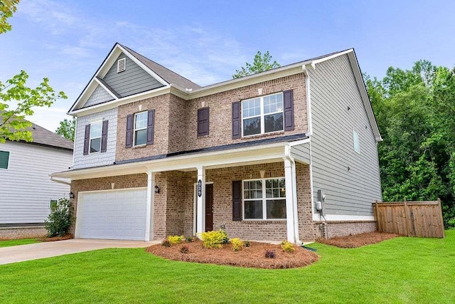 939 Brittfield Way, Loganville, GA 30052 - view of front of property with brick siding, an attached garage, driveway, and covered porch