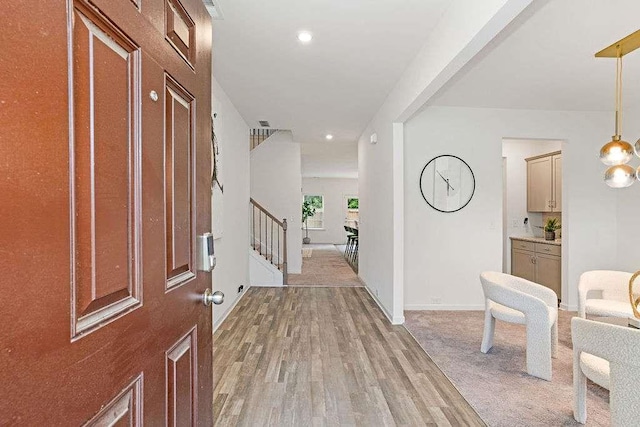 939 Brittfield Way, Loganville, GA 30052 - entrance foyer with stairway, light wood finished floors, and recessed lighting
