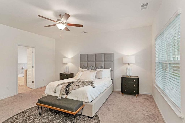 939 Brittfield Way, Loganville, GA 30052 - bedroom with carpet flooring, a ceiling fan, and connected bathroom