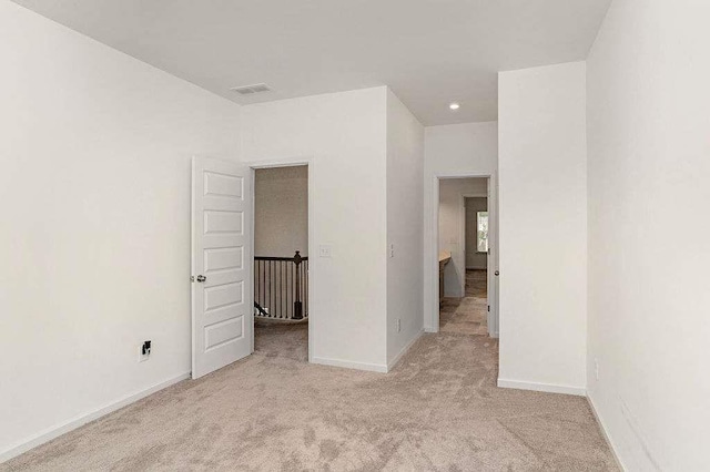 939 Brittfield Way, Loganville, GA 30052 - carpeted empty room with baseboards