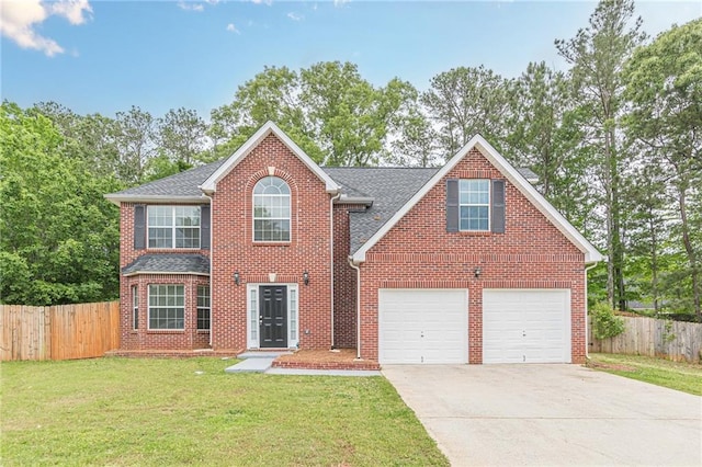 105 Kentwood Springs Dr, Hampton, GA 30228 - view of front of property with fence, a front yard, brick siding, and driveway