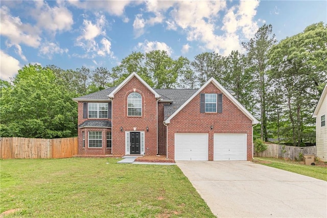 105 Kentwood Springs Dr, Hampton, GA 30228 - view of front facade featuring fence, a front lawn, brick siding, and driveway