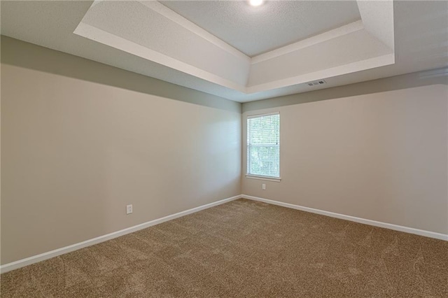 105 Kentwood Springs Dr, Hampton, GA 30228 - carpeted spare room featuring baseboards, a raised ceiling, and visible vents