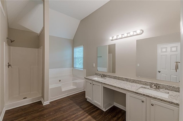 105 Kentwood Springs Dr, Hampton, GA 30228 - full bath with a bath, wood finished floors, lofted ceiling, and a sink