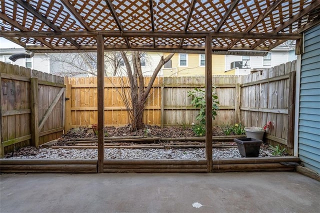 view of patio featuring fence and a pergola