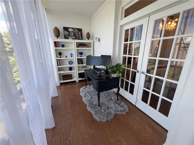 office space with dark hardwood / wood-style floors, an inviting chandelier, and french doors