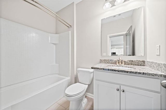 full bathroom with bathing tub / shower combination, vanity, tile patterned floors, and toilet